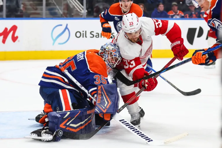 Raymond scores in shootout to lift Red Wings to 4-3 decision over Oilers